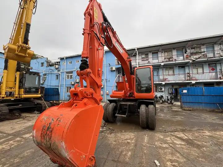 Гусеничный экскаватор 15ton Used Wheel Excavator Doosan Dh150w-7 Made In Korea For Sale With Original Good Running Condition In Shanghai 15ton Used Wheel Excavator Doosan Dh150w-7 Made In Korea For Sale With Original Good Running Condition In Shanghai- Photo 3